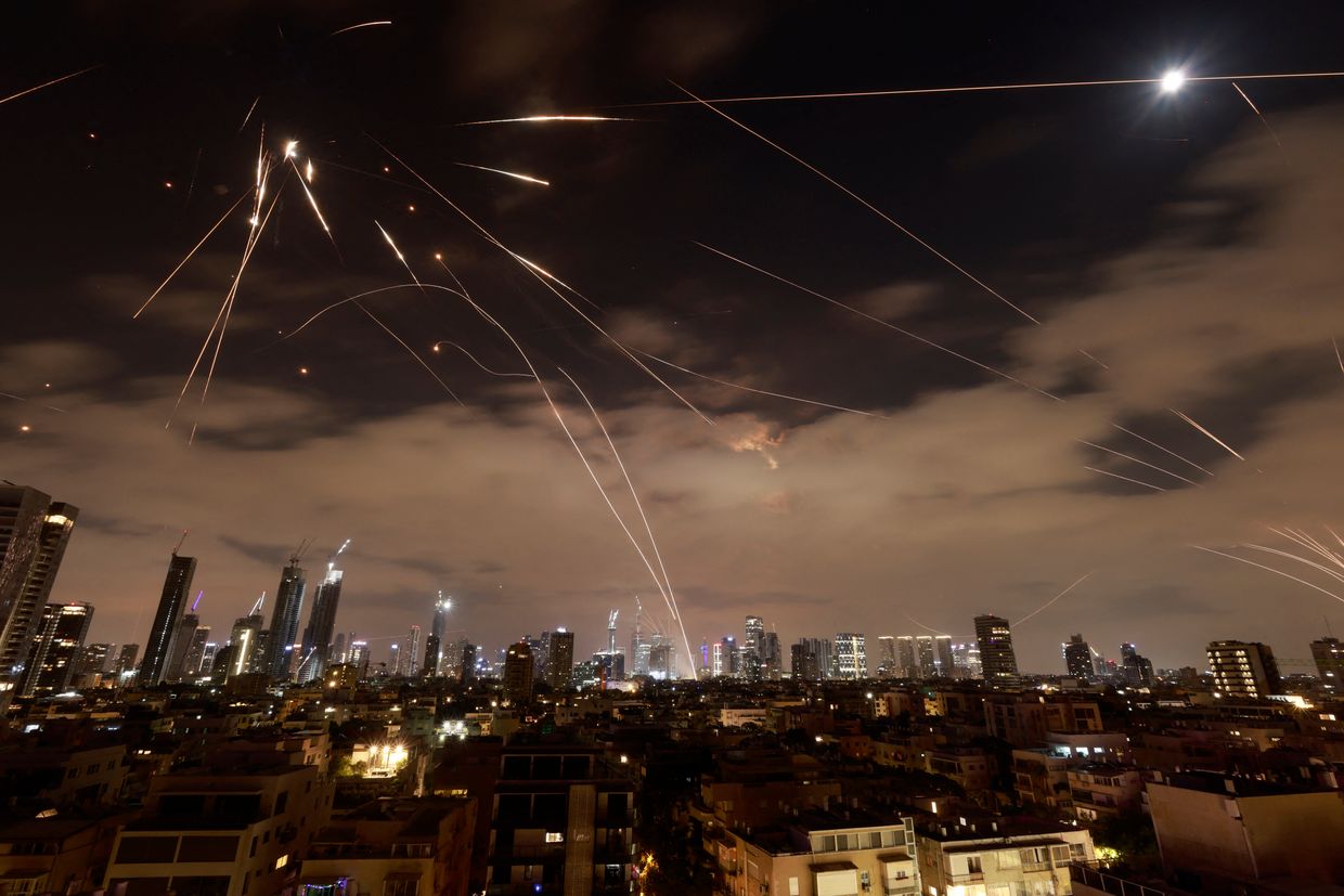 Israeli air defense systems intercept Iranian missiles over Tel Aviv during a fresh barrage on June 16, 2025. 