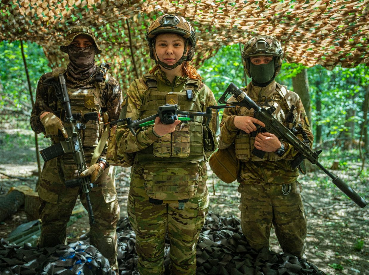 Ukrainian soldiers from the Khartiia Brigade pose for a photo in an unspecified location, Ukraine, on an unspecified date. 