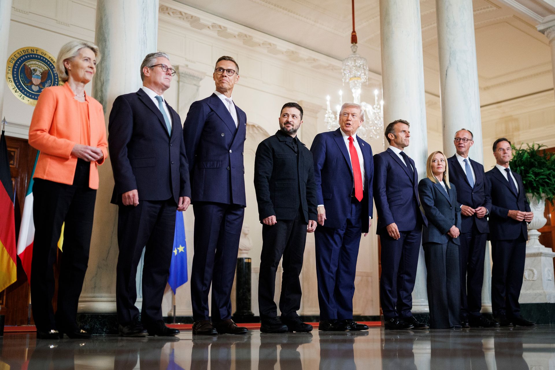 U.S. President Donald Trump (C-R) and President Volodymyr Zelensky (C-L) stand with European and NATO leaders for a family photo in Washington, D.C., U.S. on Aug. 18, 2025.