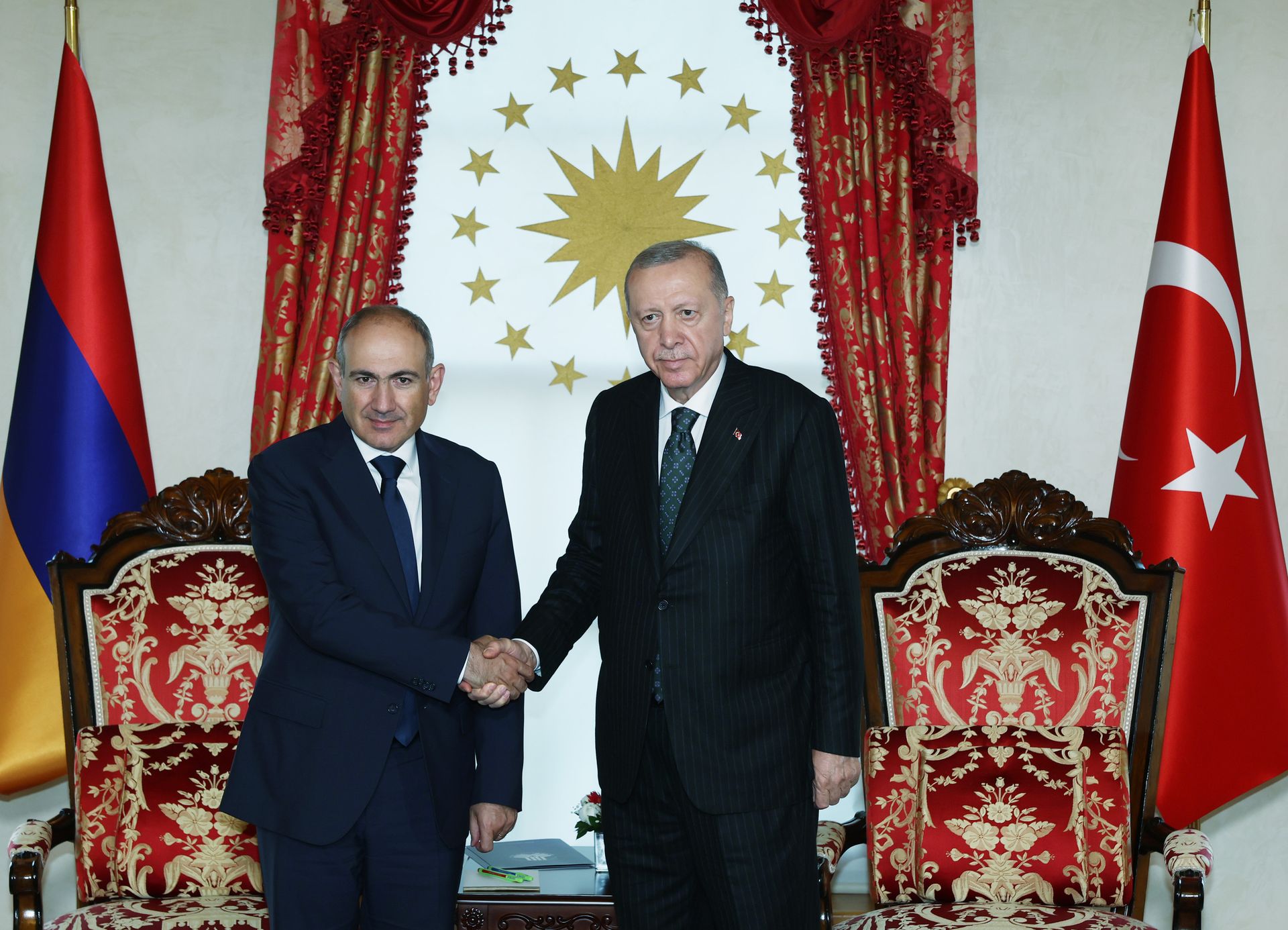 Turkish President Recep Tayyip Erdogan (R) receives Armenian Prime Minister Nikol Pashinyan (L) at the Dolmabahce Presidential Office in Istanbul, Türkiye, on June 20, 2025. 