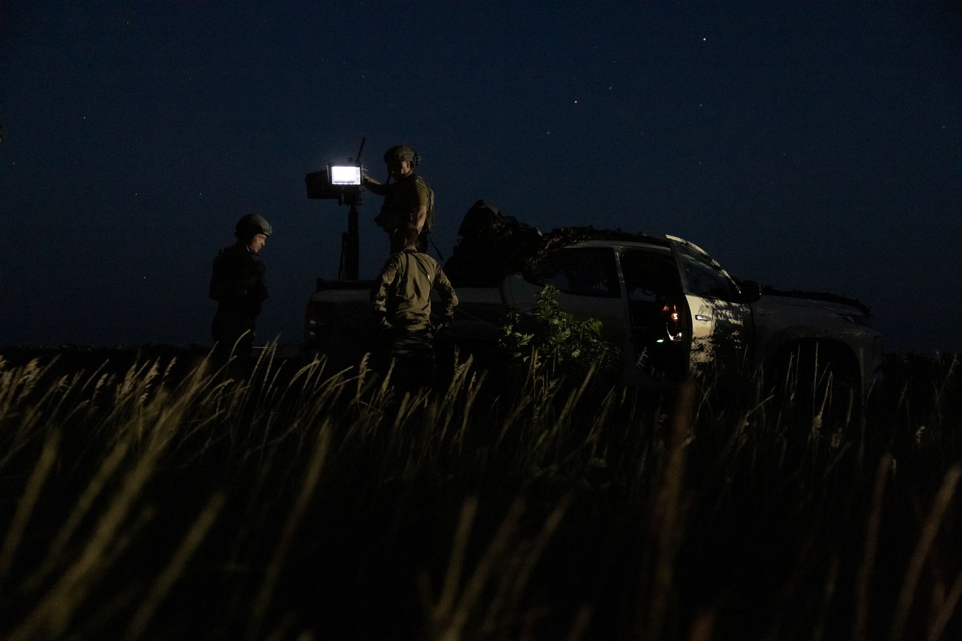 Ukrainian servicemen of the mobile air defense unit of the 641st Separate Anti-Aircraft Machine Gun Battalion wait for potential air threats at a position in Donetsk Oblast, Ukraine, on July 15, 2025.