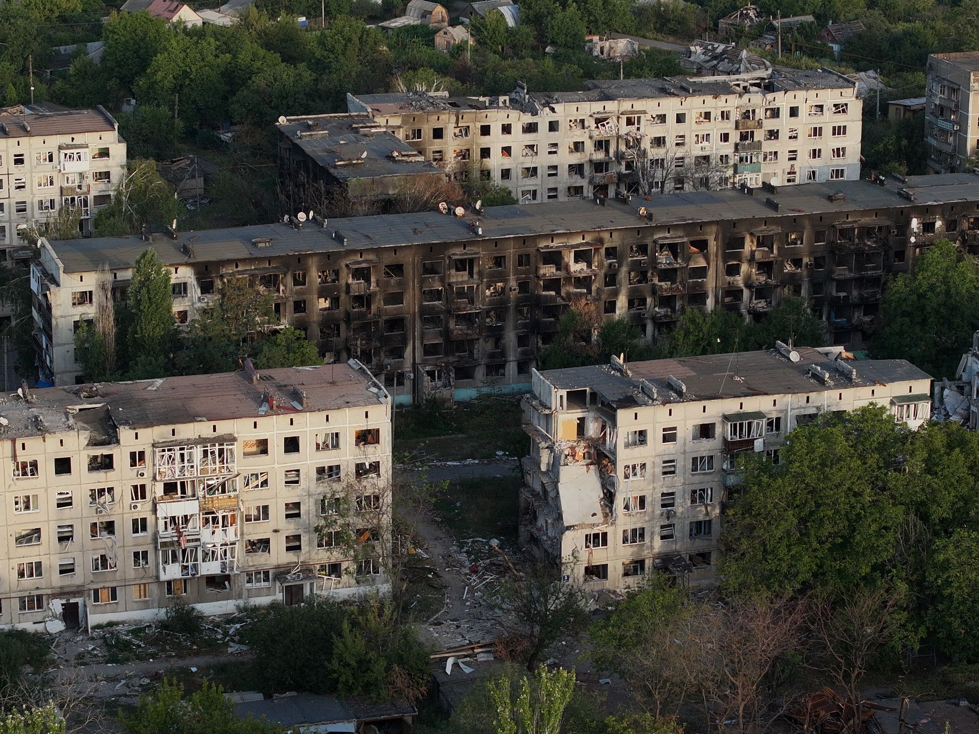 In an aerial view, destroyed apartment buildings remain in a residential district hit by Russian shelling in Pokrovsk, Donetsk Oblast, Ukraine, on Aug. 31, 2025.