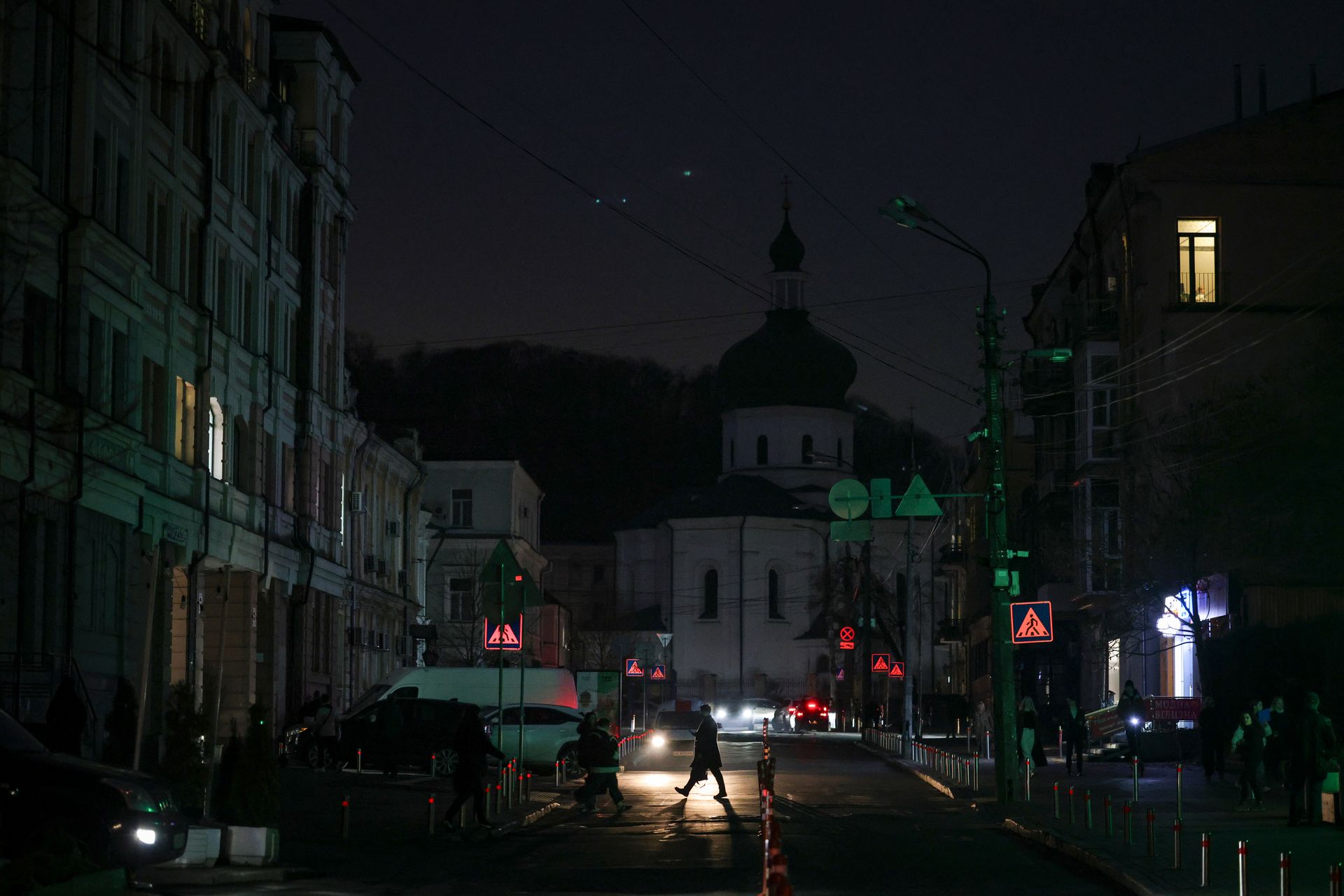 A view of a darkened street amid ongoing emergency power outages following intensified Russian missile strikes on Ukraine’s energy infrastructure in Kyiv, Ukraine, on Nov. 5, 2025.