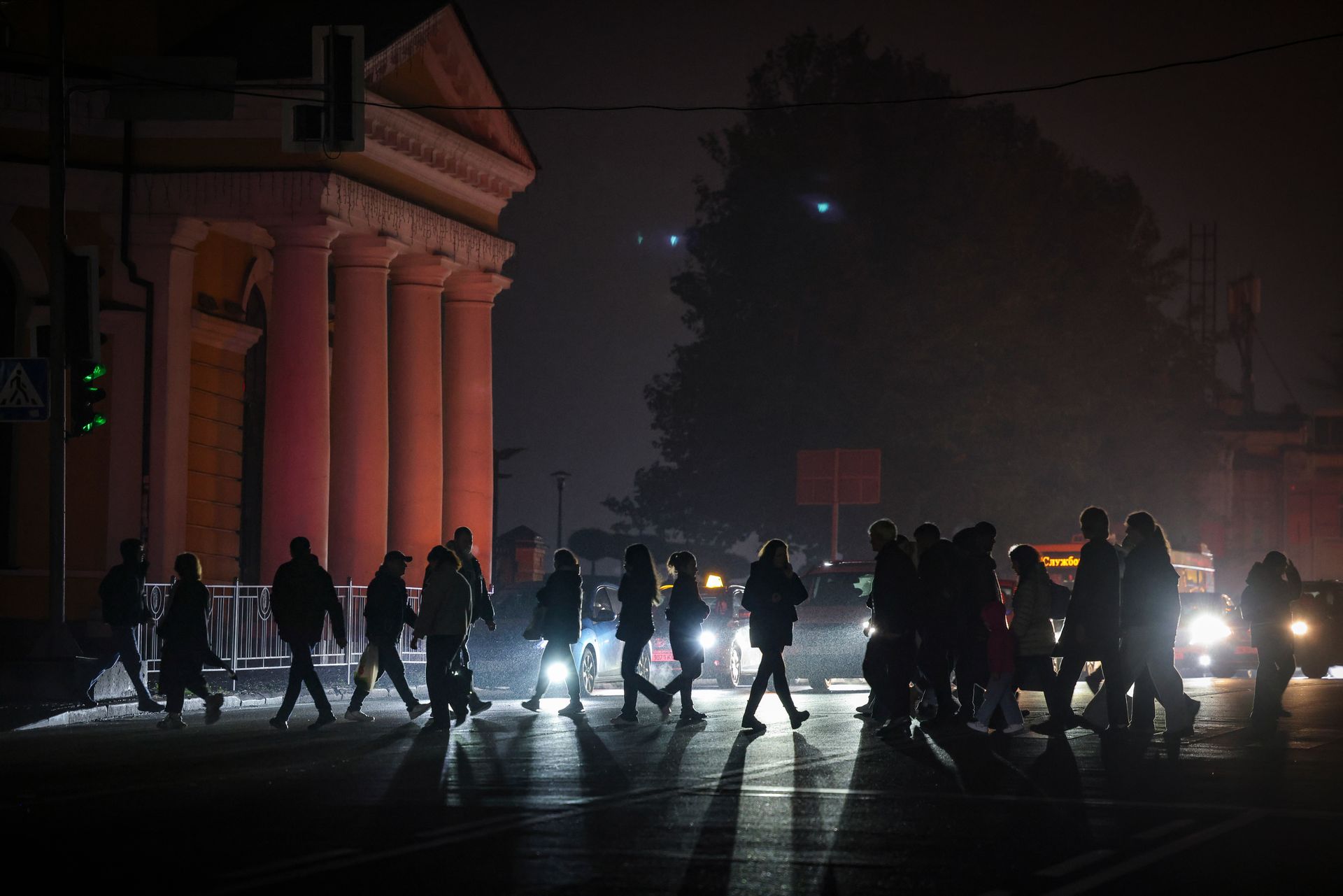 A view of a darkened street amid ongoing emergency power outages following intensified Russian missile strikes on Ukraine’s energy infrastructure in Kyiv, Ukraine, on Nov. 5, 2025. 