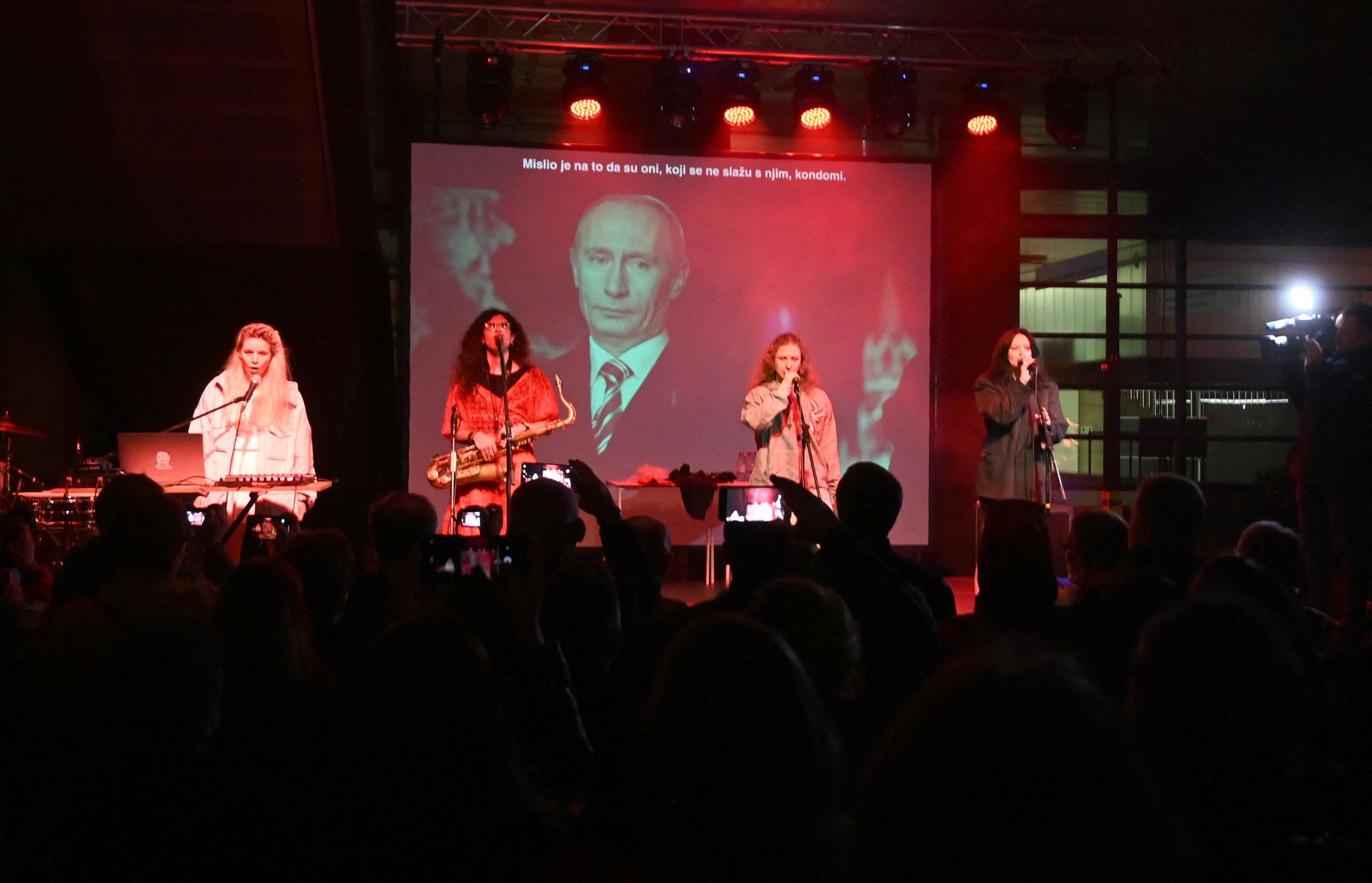 Russian political activists and members of the punk rock group Pussy Riot perform during a concert at the Zagreb Museum of Contemporary Art in Zagreb, Croatia, on May 30, 2022. 