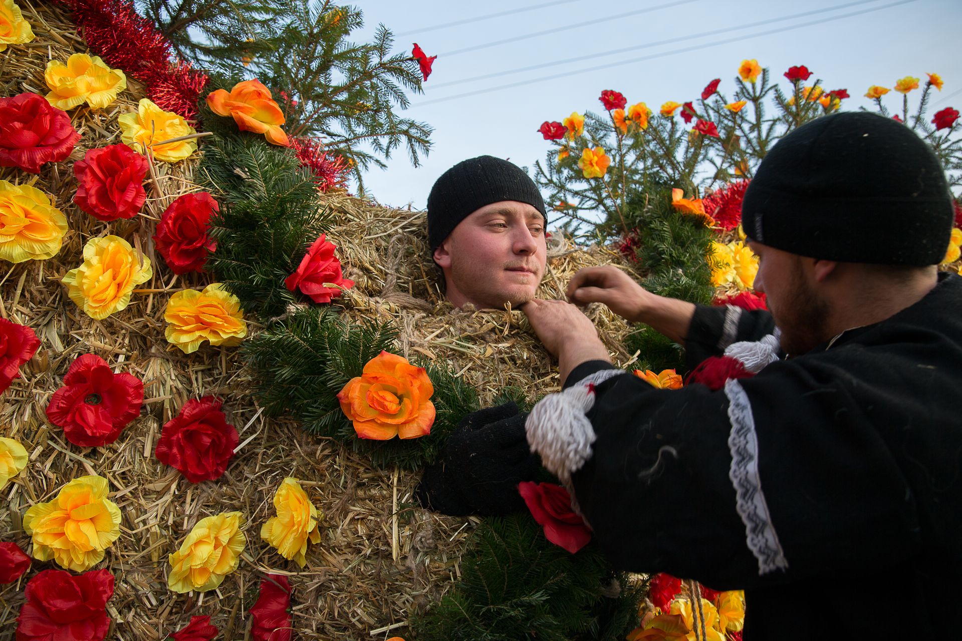 People prepare their costumes ahead of Malanka celebrations in Krasnoilsk, Chernivtsi Oblast, Ukraine, on Jan. 13, 2022. 
