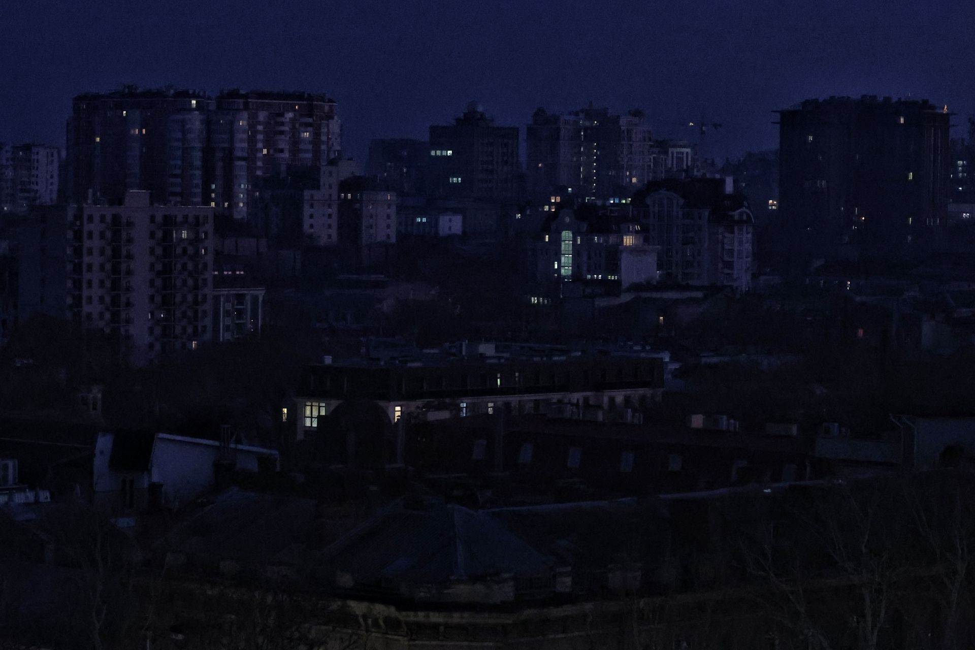 A view of residential buildings during a blackout after a Russian attack in Odesa, Ukraine, on Dec. 19, 2025. 