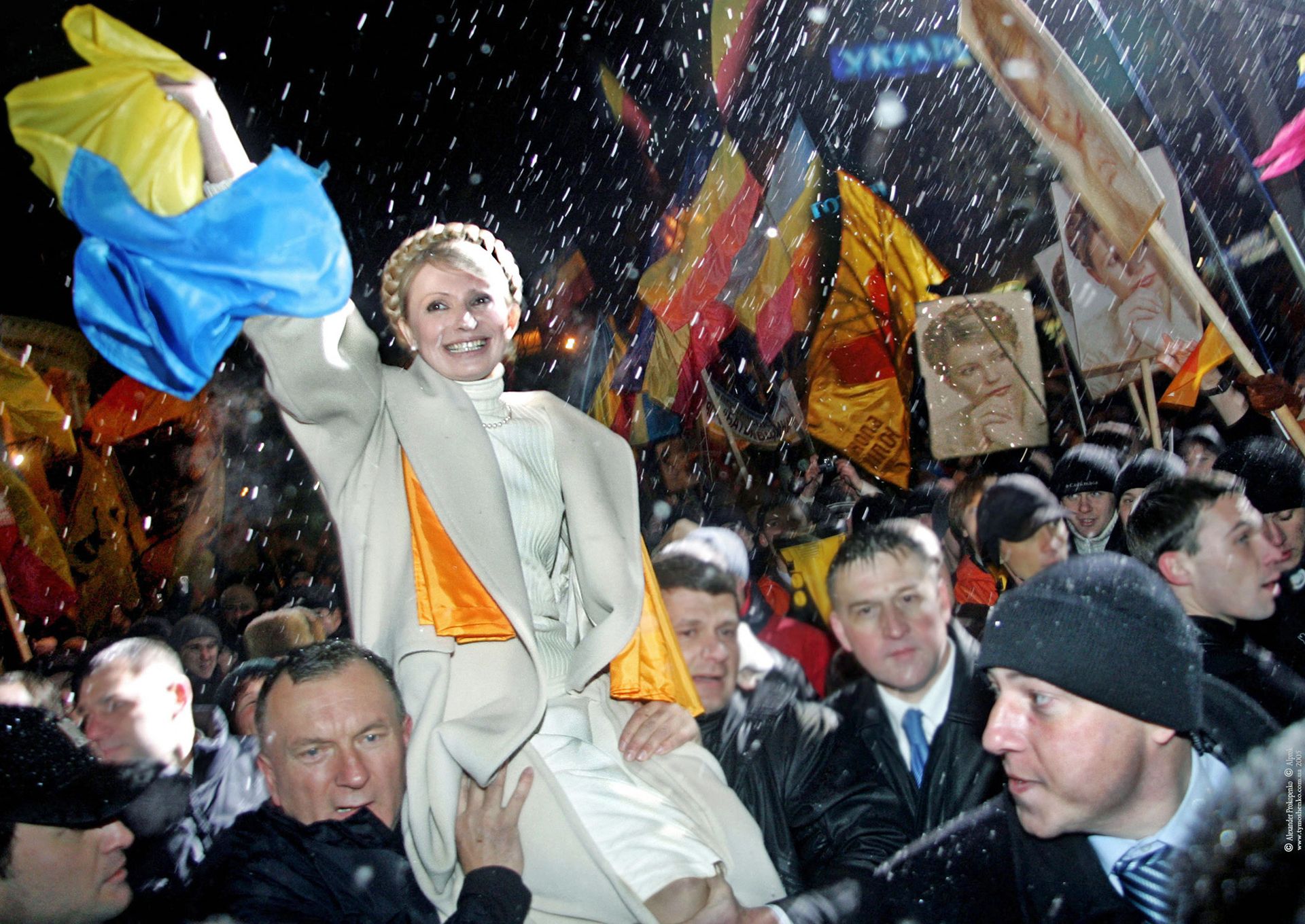 Supporters carry Yuliia Tymoshenko, one of the leaders of the Orange Revolution and a former prime minister, onto a platform during a rally on Independence Square in Kyiv, Ukraine, on Nov. 22, 2005. 