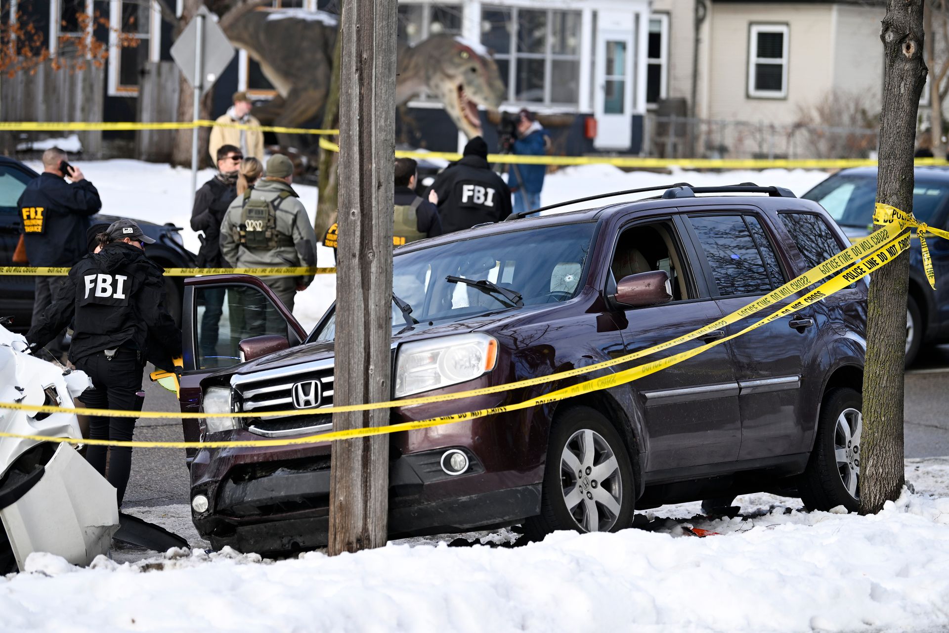 Members of law enforcement work the scene following the fatal shooting of Renee Good by an ICE agent in Minneapolis, Minnesota, U.S., on Jan. 7, 2026.
