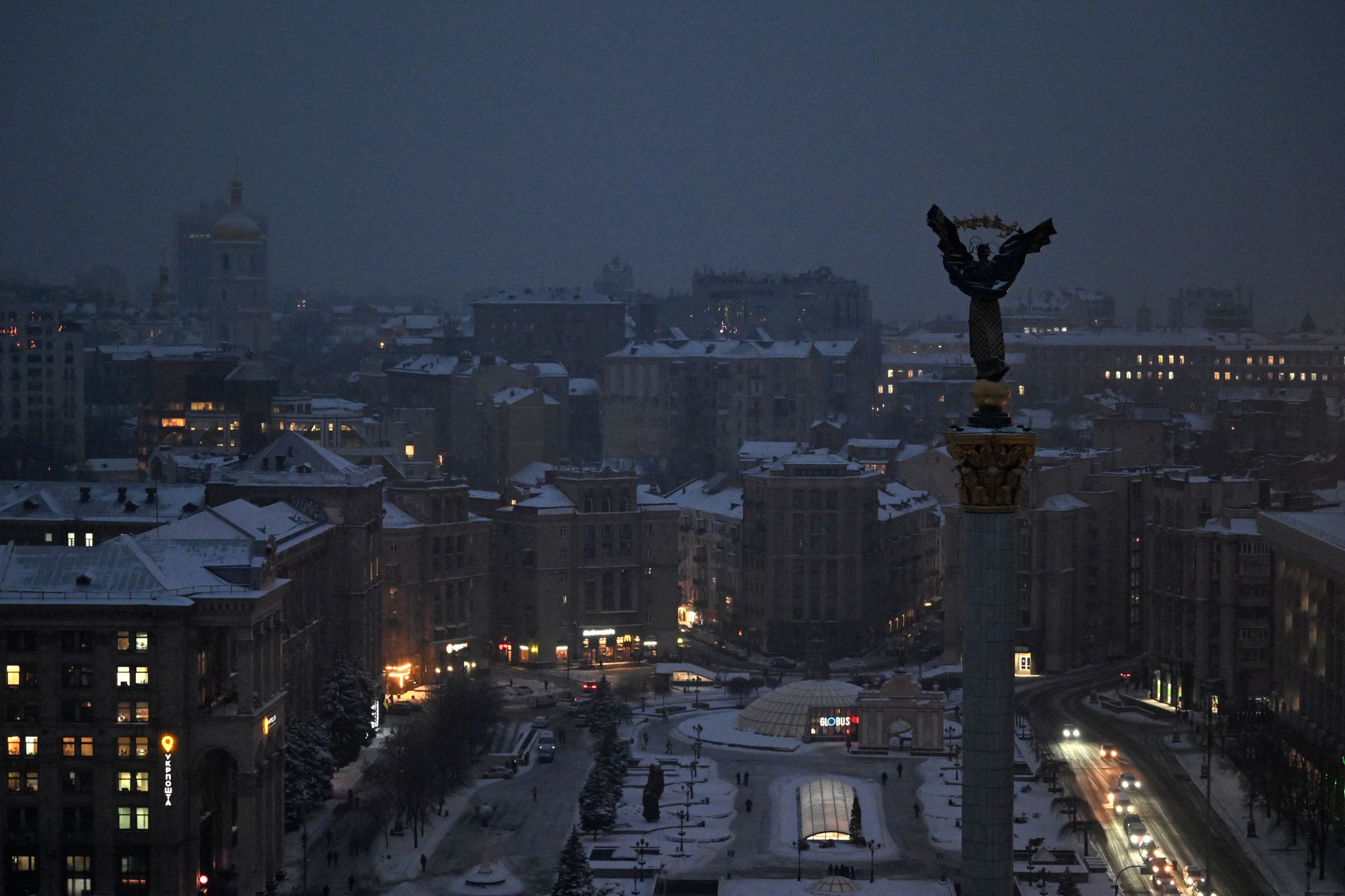 Cars drive along Independence Square at night in Kyiv, Ukraine, on Jan. 13, 2026