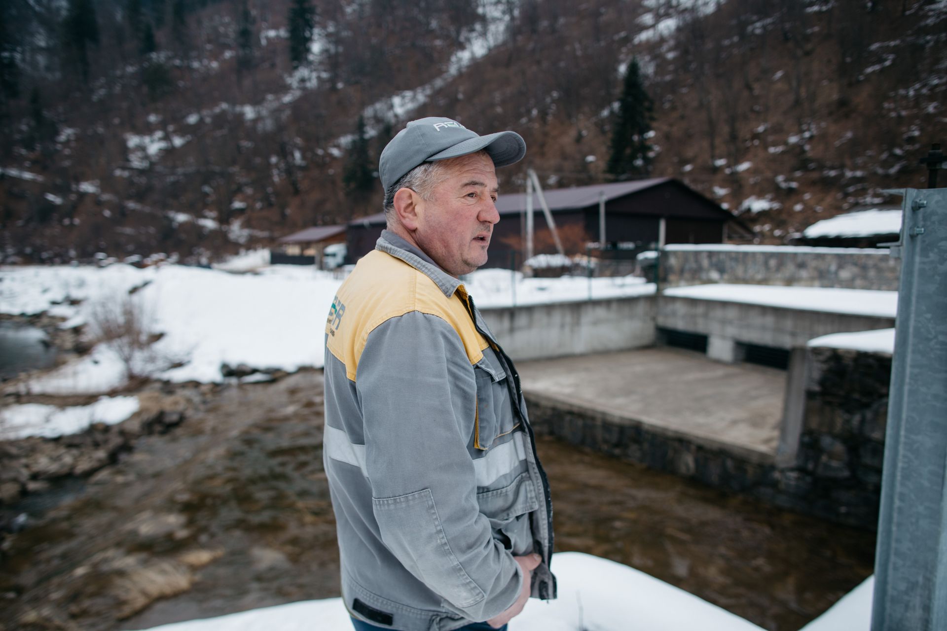 Ivan, a technician at a hydroelectric power plant, monitors equipment in Ust-Chorna, Zakarpattia Oblast, Ukraine, on Feb. 10, 2026.
