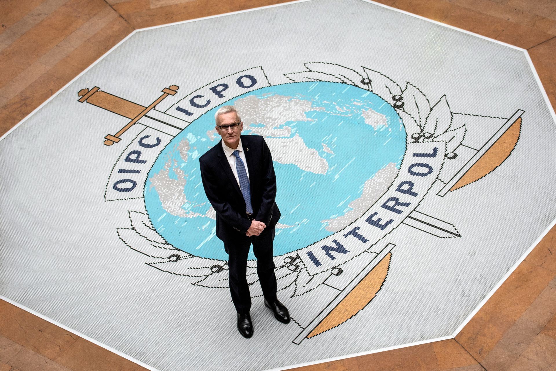 Interpol Secretary General Jurgen Stock poses for a photograph at Interpol headquarters in Lyon, France, on Nov. 8, 2018. 