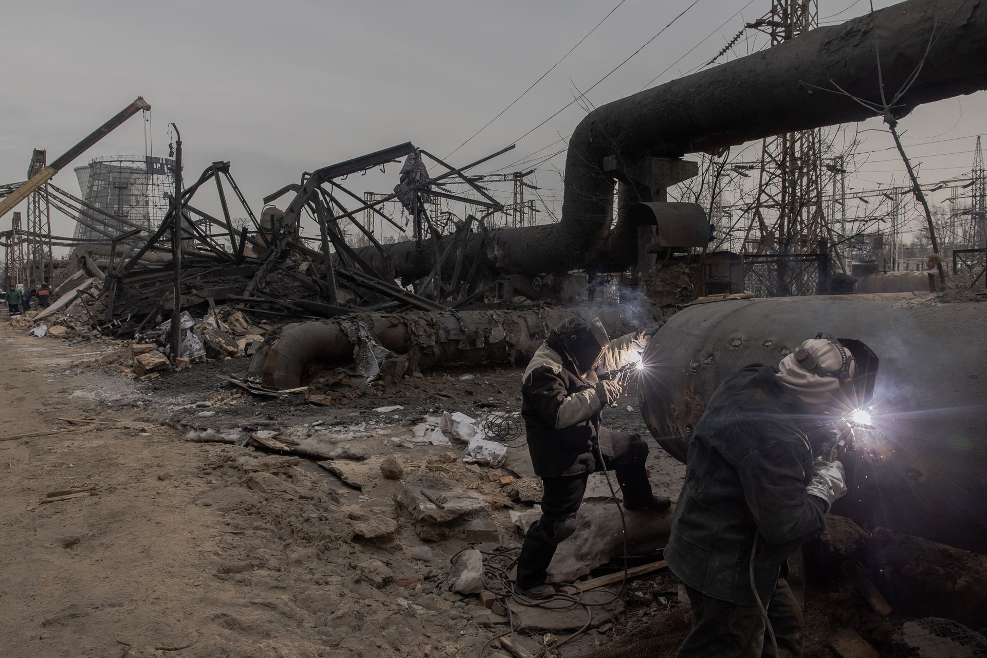 Employees repair sections of the Darnytska combined heat and power plant damaged by Russian air strikes in Kyiv, Ukraine, on Feb. 4, 2026. 