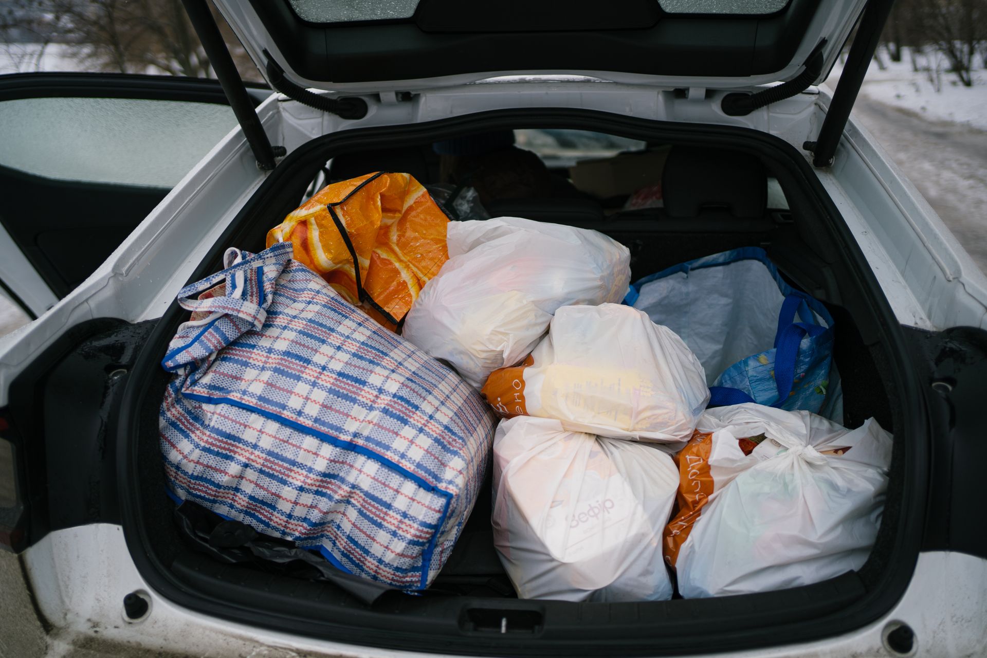 Care packages from the Starenki foundation are seen in the trunk of the car in Kyiv, Ukraine, on Jan. 27, 2026. 