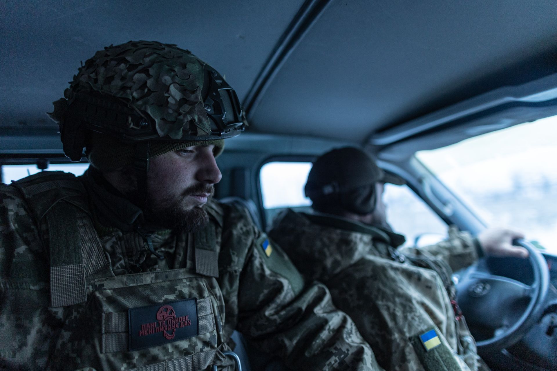 Ukrainian soldiers inside the military vehicle in Donetsk Oblast, Ukraine, on Jan. 22, 2026.
