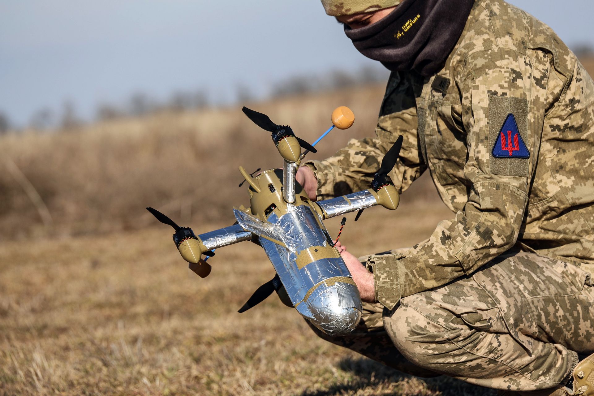 A soldier prepares an interceptor drone for launch as the unit carries out combat missions in Ukraine on March 4, 2026.