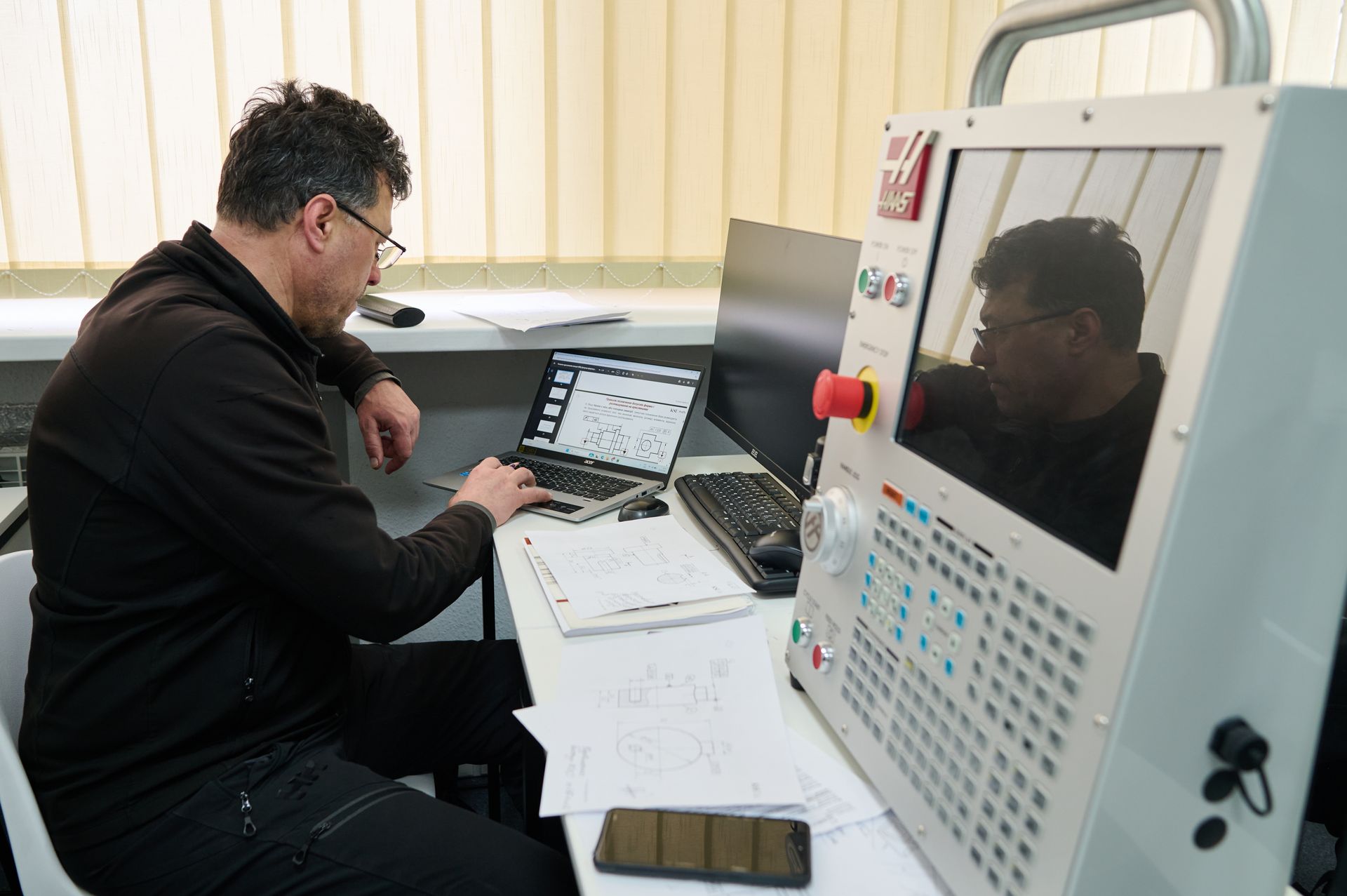 KSE ProfTech students train in a classroom equipped with machine control units (MCUs) for CNC machines at the KSE ProfTech facility in Kyiv, Ukraine, on Feb. 25, 2026. 