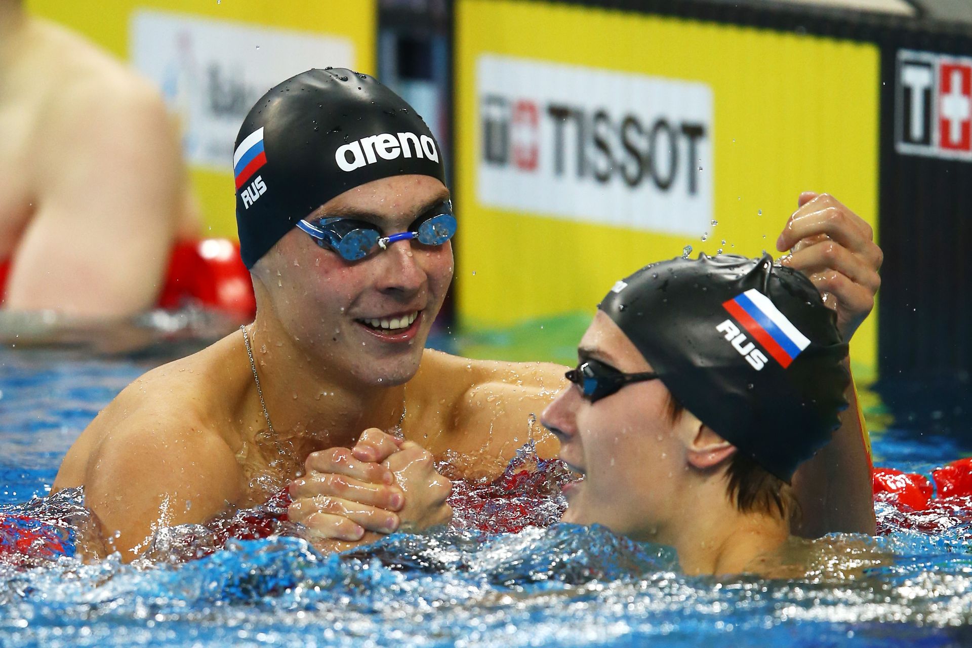 Russian, Belarusian swimmers allowed to compete under national flags after ban lifted