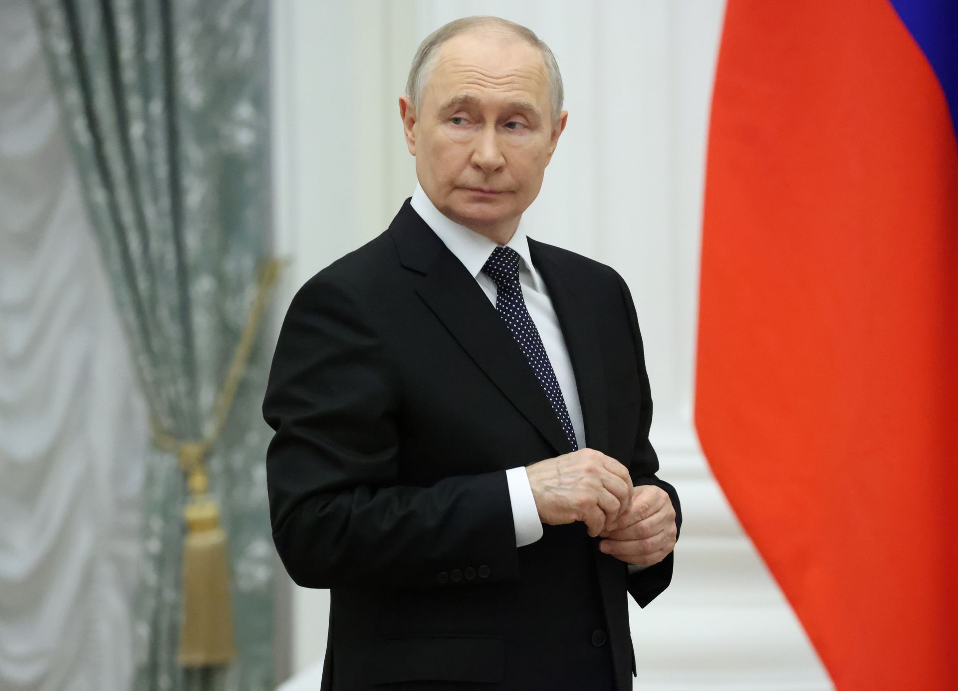 Putin signs law authorizing use of military force to 'protect Russian citizens' abroad
