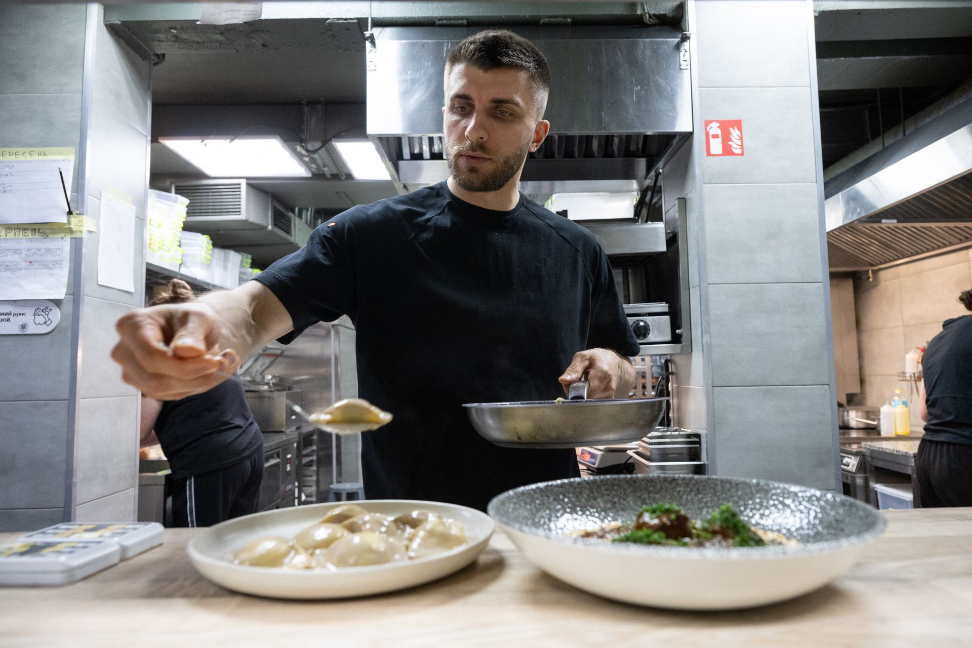 A Kyiv restaurant keeps rebuilding and serving customers after repeated attacks