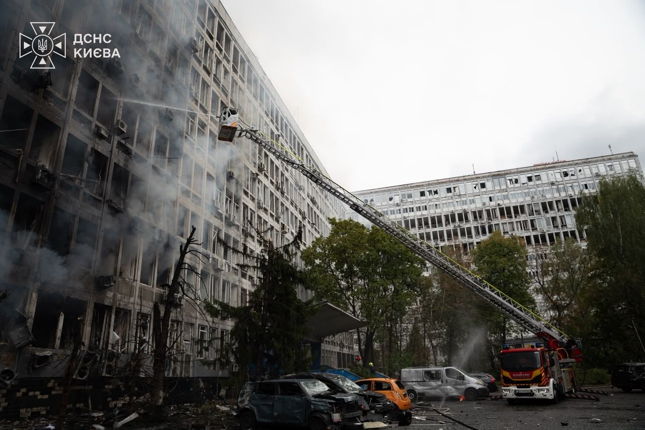Emergency crews respond after Russian drones struck Kyiv, damaging the historic Shayba market and a petrol station, Sept. 23, 2026